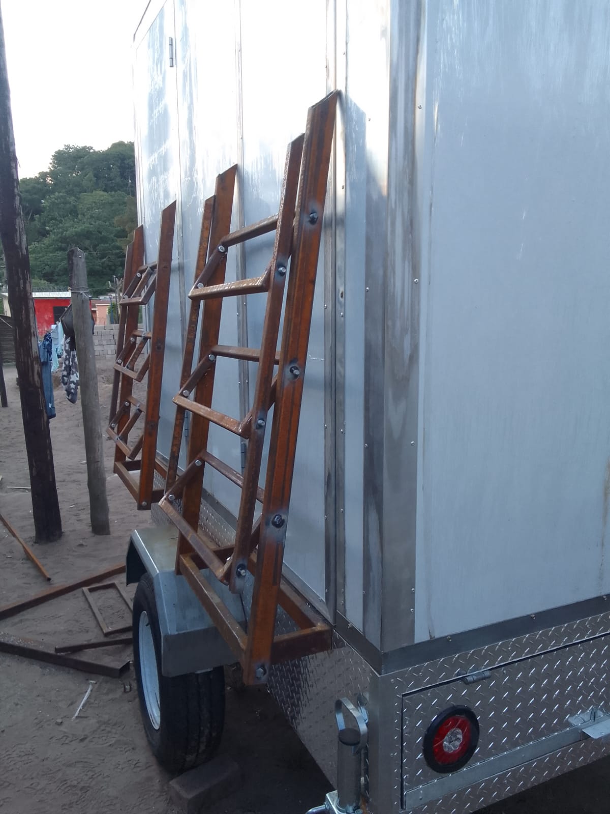 Nkhala project photo: trailer panel installation